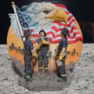 Patriotic Firefighter Sculpture with American Flag